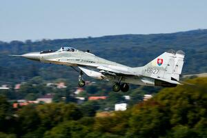 Military fighter jet plane at air base. Air force flight operation. Aviation and aircraft. Air defense. Military industry. Fly and flying. photo