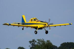 Special mission plane at air base. Air force flight operation. Aviation and aircraft. Firefighting and firekiller. Military industry. Fly and flying. photo