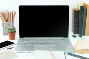 Laptop screen on the table photo