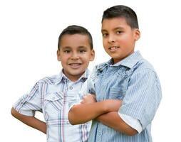 Two Happy Young Hispanic School Boys Isolated on White. photo