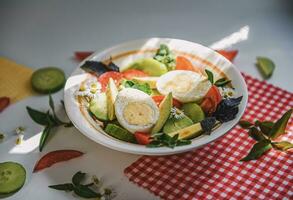 Breakfast with egg and vegetable salad photo