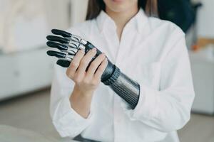 Embracing the future with a bionic hand, the epitome of human-technology synergy photo