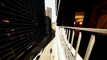 A bustling city street captured from a high-rise balcony photo