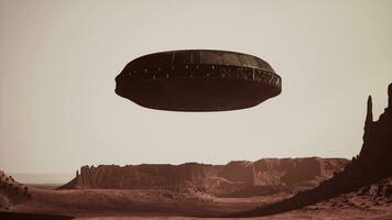 bizarre spacecraft suspended over the Arizona terrain photo