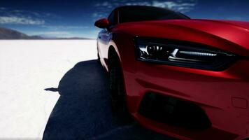 lonely sport car in salt desert photo