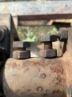 rusty old metal pipe of machine photo