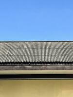 roof of the house with blue sky photo