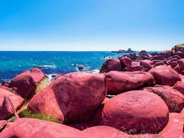 red rocks in the atlantic ocean photo