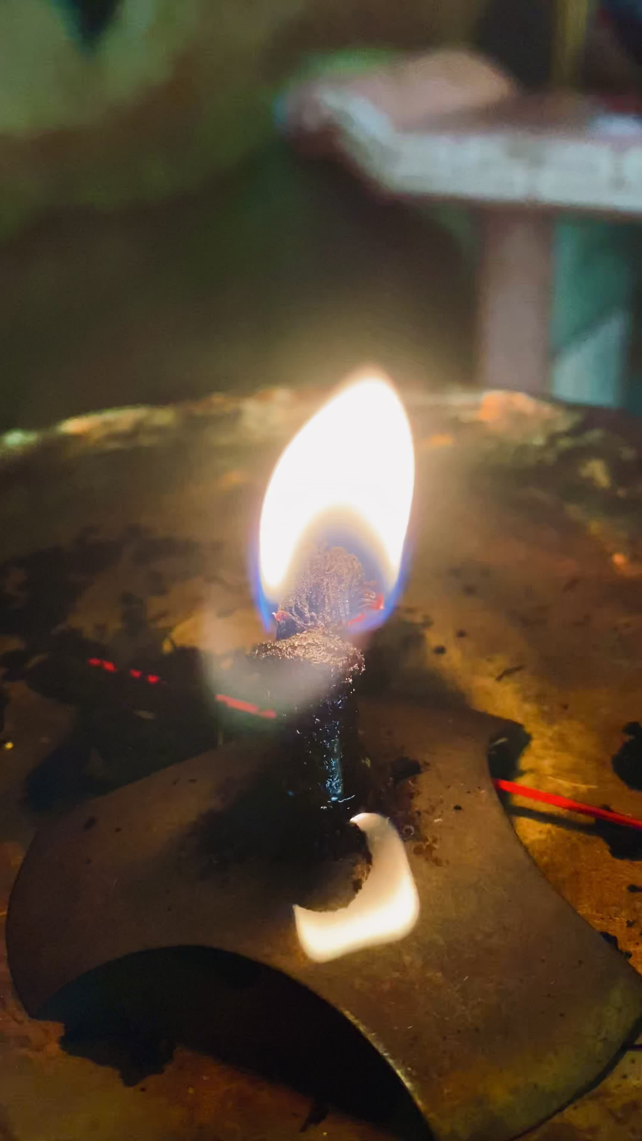 Flames under candlelight for worshiping sacred objects according to