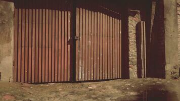 Old abandoned industrial street view with brick facades photo