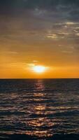 Sky sunset timelapse at beach scenery, Whether it's the warm hues of sunset timelapse, or the shimmering reflection of the sun, sunset has the power to inspire feelings of wonder. video