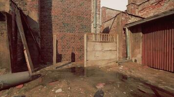 Old abandoned industrial street view with brick facades photo