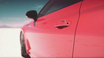 Close up detail of sport car in salt desert photo