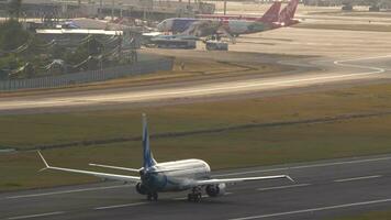 PHUKET, THAILAND FEBRUARY 19, 2023 Jet aircraft Boeing 737 of SCAT departure at Phuket airport. Aircraft speed up before taking of. Travel concept video