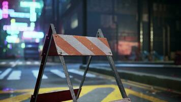 A construction sign sitting on the side of a road photo