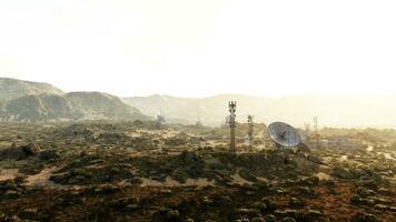 An observatory surveillance antenna on top of a hill photo