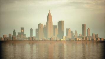 Beautiful sun ray over downtown during hazy sunrise photo