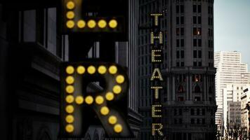 A brightly lit theater sign photo