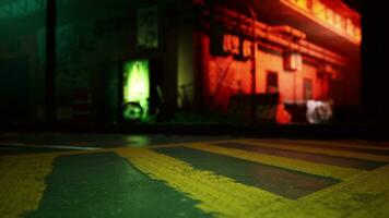 A green and yellow street sign sitting on the side of a road photo