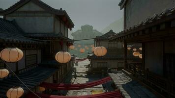 A street with lanterns hanging from it's sides photo
