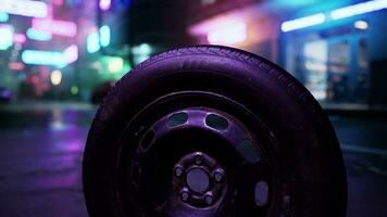 A close up of a tire on a city street photo