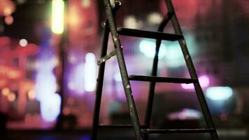 A wooden ladder sitting on top of a sidewalk photo