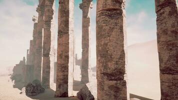 Columns and statues of the temple main entrance photo