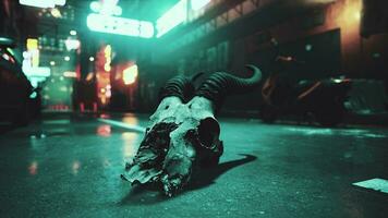 A bull skull laying on the ground in the middle of a street photo