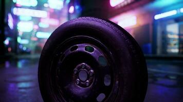 A close up of a tire on a city street photo