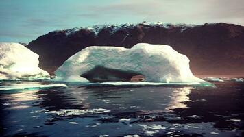 Icebergs. glaciers and mountains of Antartic peninsula photo