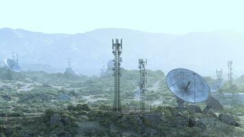 Satellite dishes on a green hillside, capturing signals from space photo