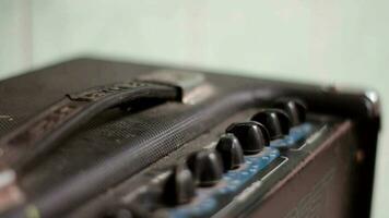 Close Up Of Hand Turning The Amplifier Knob. video