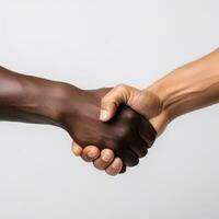 Closeup of two arms different race skin colors multinational friends shaking hands. AI Generated photo