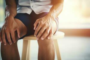 Joint pain, Arthritis and tendon problems. a man touching nee at pain point. AI Generated photo