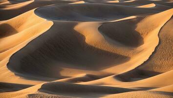 ai generado majestuoso Desierto duna olas en el tarde foto