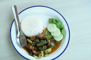 Thai food  Stir fried crispy pork with basil photo