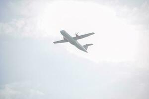 New Delhi, India, April 16 2023 - Private Jet take off from Indra Gandhi International Airport Delhi, Compact plane domestic aeroplane flying in the blue sky during day time photo