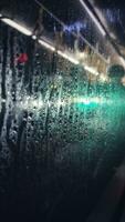 Defocused Abstract Image Of a Foggy Window, Taken From Inside a Bus photo