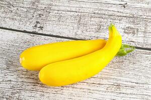 Yellow young zucchini for cooking photo