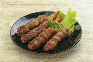 Beef kebab skewer minced meat photo