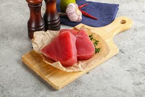 Delicous raw tuna steak for cooking photo