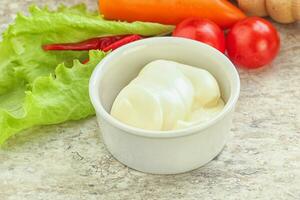 Organic mayonnaise sauce in the bowl photo