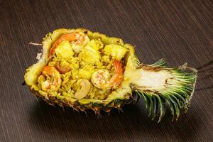 Thai cuisine - rice with prawn in pineapple photo