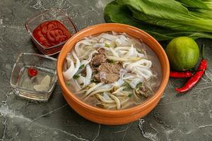 Vietnamese soup Pho Bo with beef photo