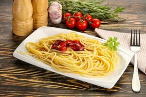 Italian pasta spaghetti with tomato photo