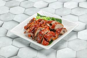 Asian cuisine - roasted duck with skin photo