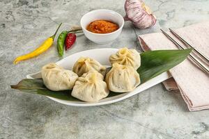 Chinese traditional steamed dumpligs momo photo