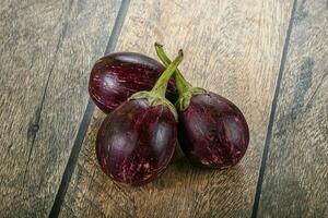 Raw smal asian baby eggplant photo