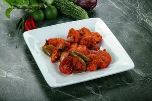 Indian cuisine - chicken tikka barbecue photo