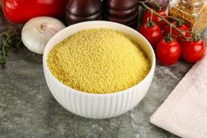 Raw dry wheat couscous grain photo